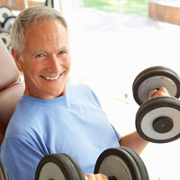 Man Working Out at the Gym